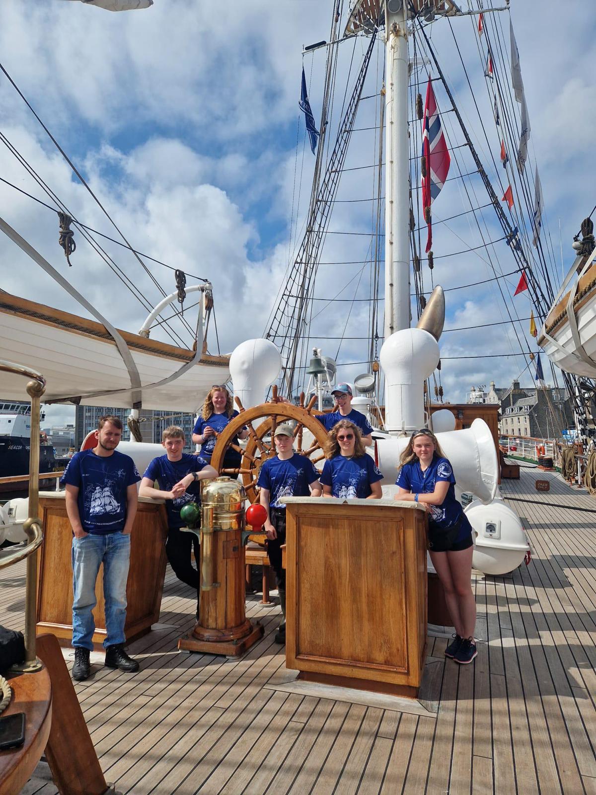 Sail trainees onboard ship